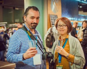 Man and woman acting as international ambassadors for beer festivals